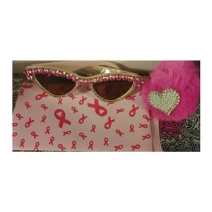 Pink sunglasses, keychain & small pouch.